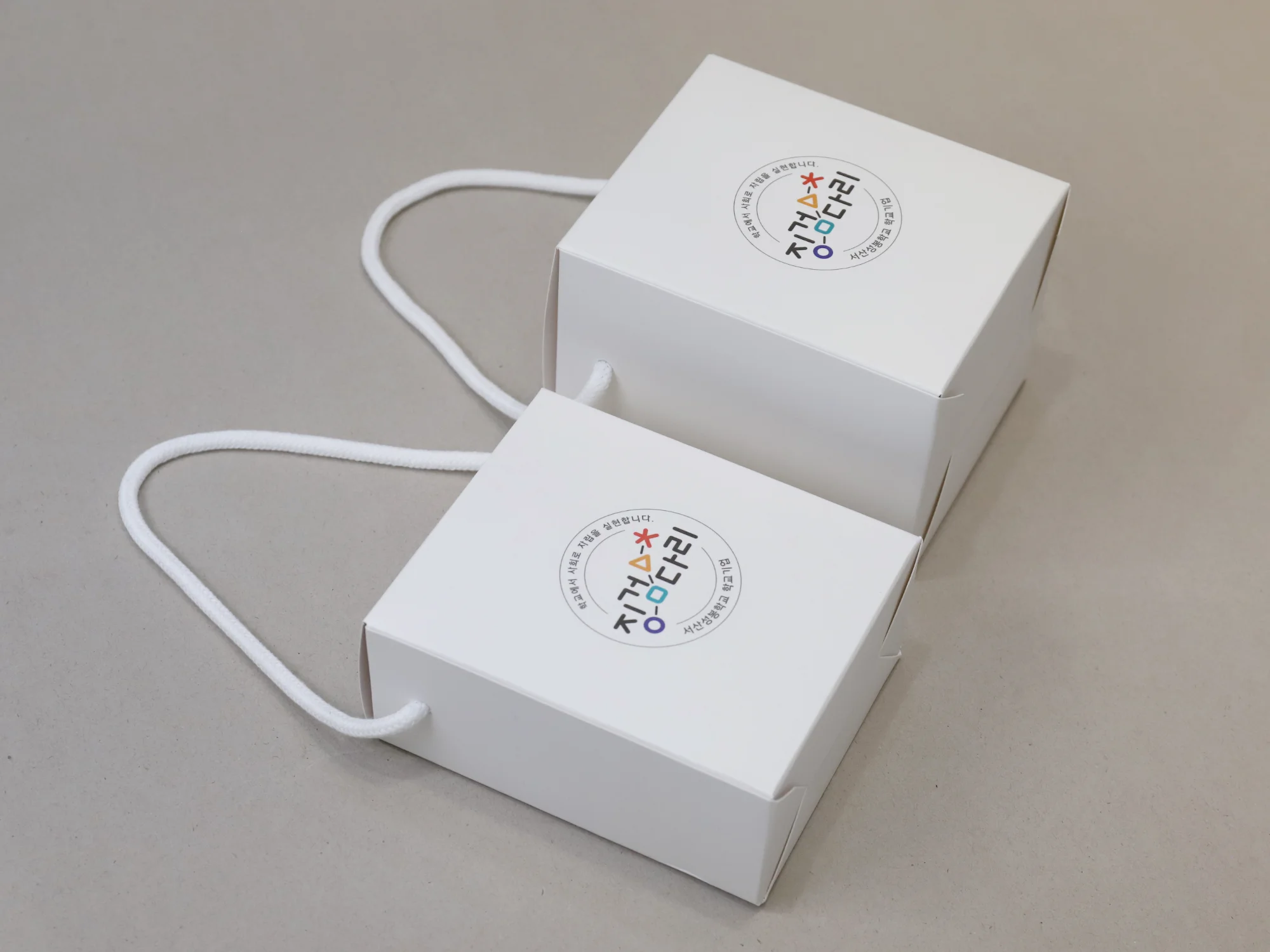 징검다리 드립백  손잡이 박스 박스 제작 사례 - 방산포장