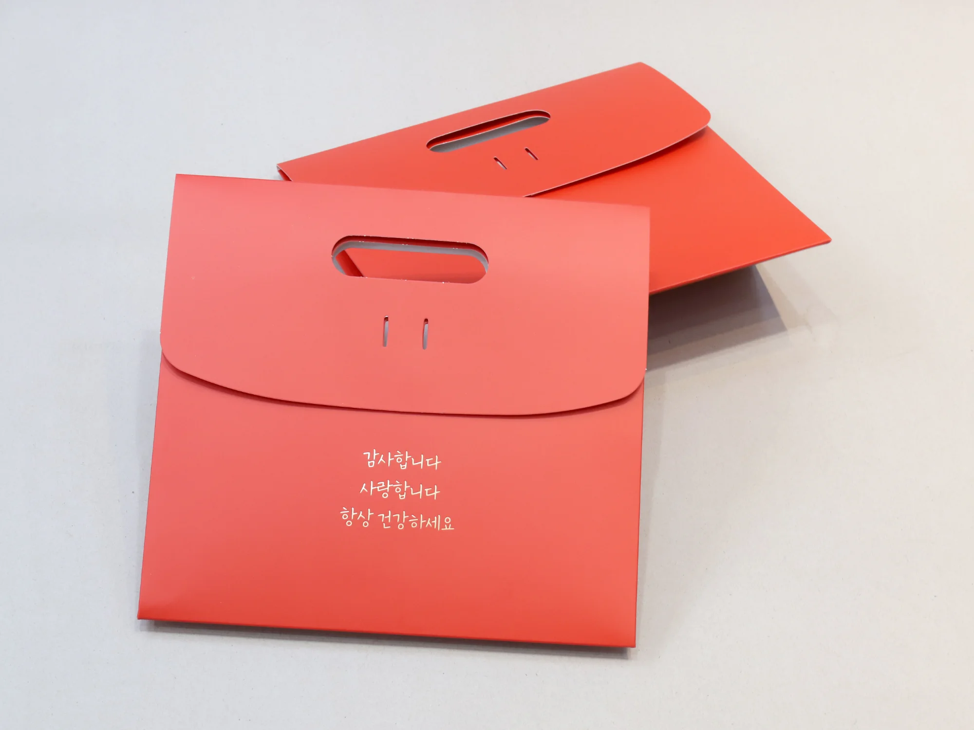 딜라이트오 손잡이 타공 쇼핑백 쇼핑백 제작 사례 - 방산포장