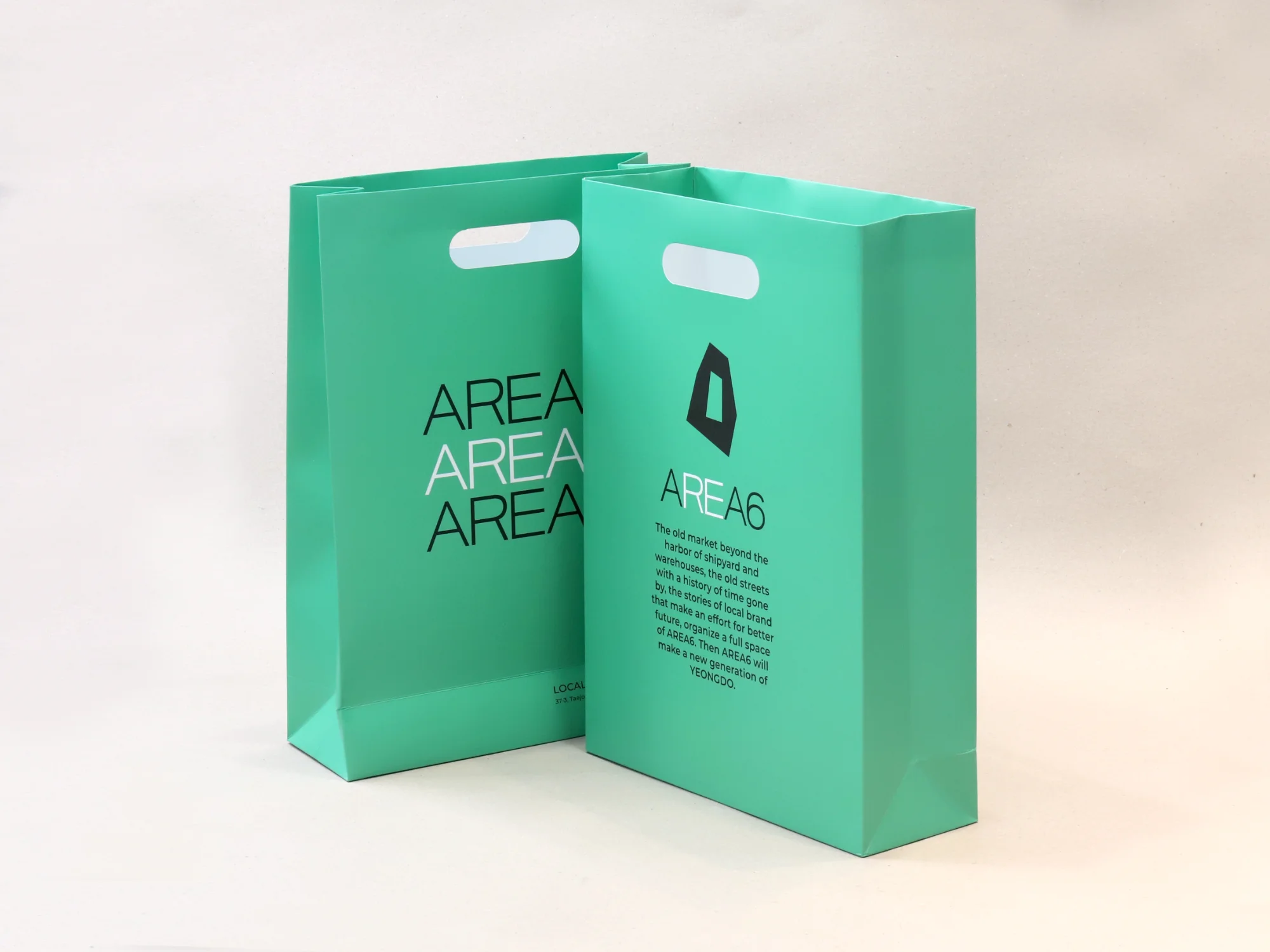아레아식스 손잡이타공 쇼핑백 쇼핑백 제작 사례 - 방산포장