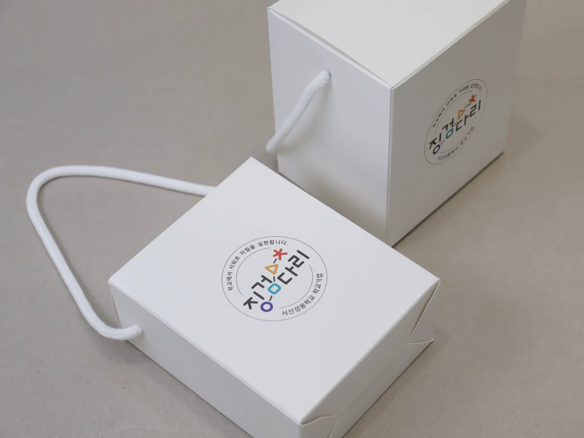 징검다리 드립백  손잡이 박스 박스 제작 사례 - 방산포장