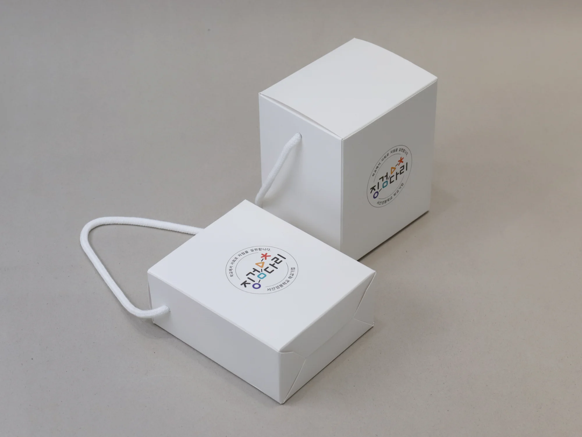 징검다리 드립백  손잡이 박스 박스 제작 사례 - 방산포장