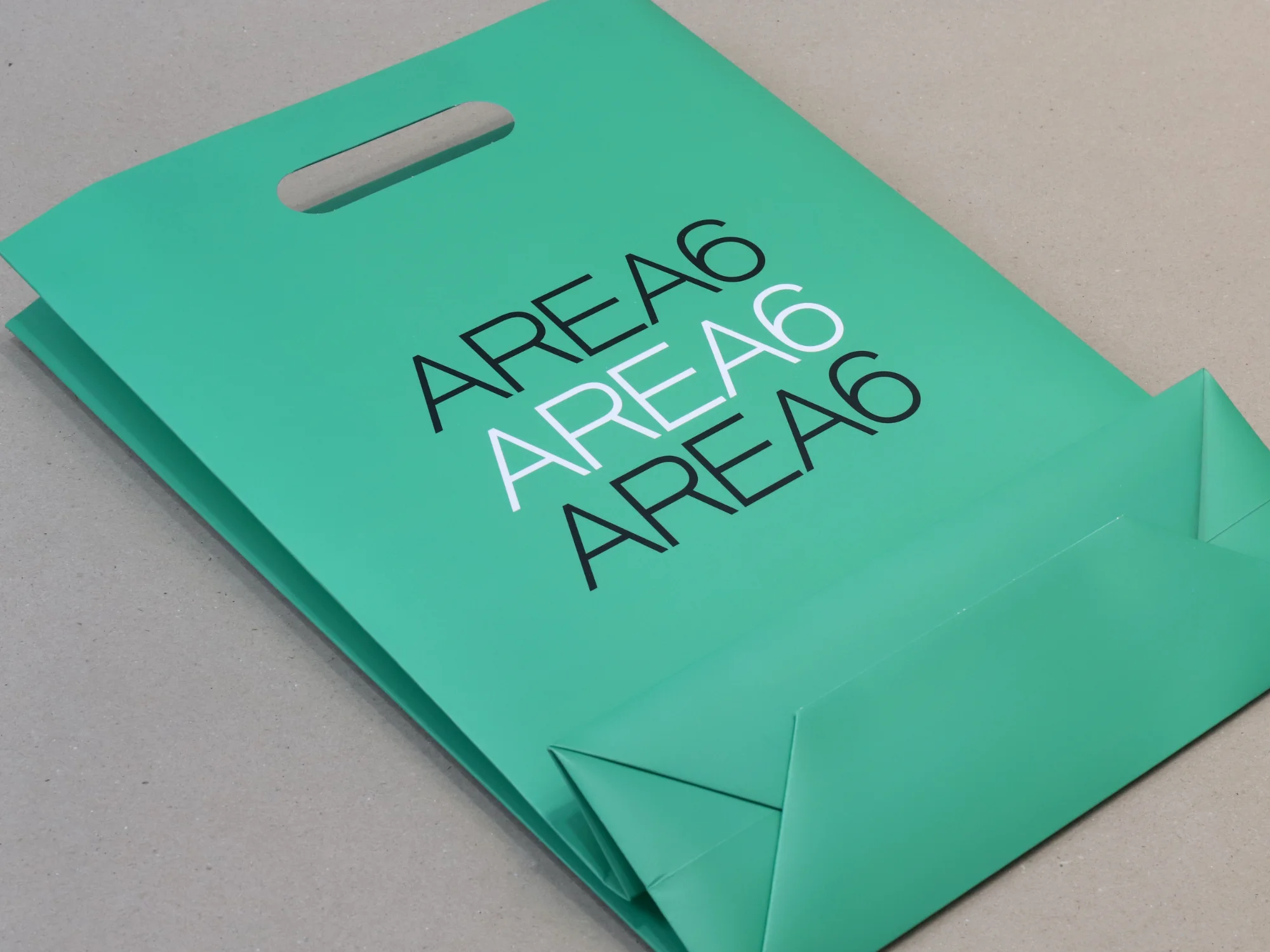 아레아식스 손잡이타공 쇼핑백 쇼핑백 제작 사례 - 방산포장